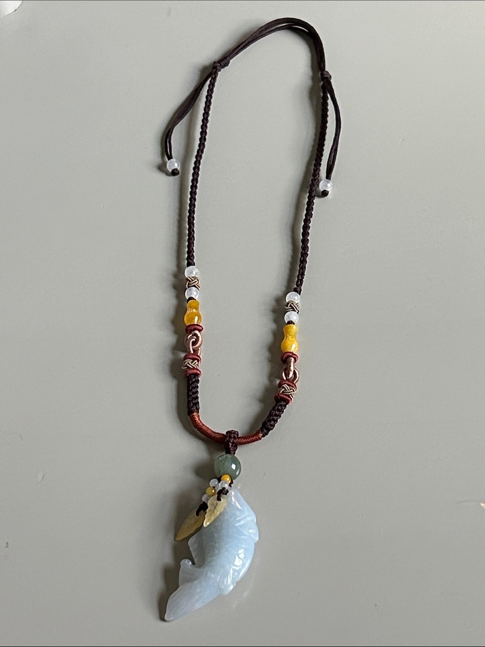 Hand carved jade/gemstone fish with hand knotted beads necklace